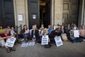 Activists block access to the German Ministry of Finance in a protest against the G7 in Berlin