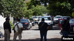 Police guard the place where journalist Antonio de la Cruz was shot on Wednesday, June 29, 2022, in Tamaulipas, Mexico.