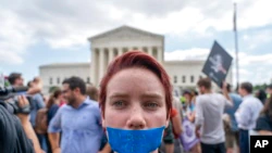 In Photos |  Activists for and against abortion demonstrate outside the Supreme Court