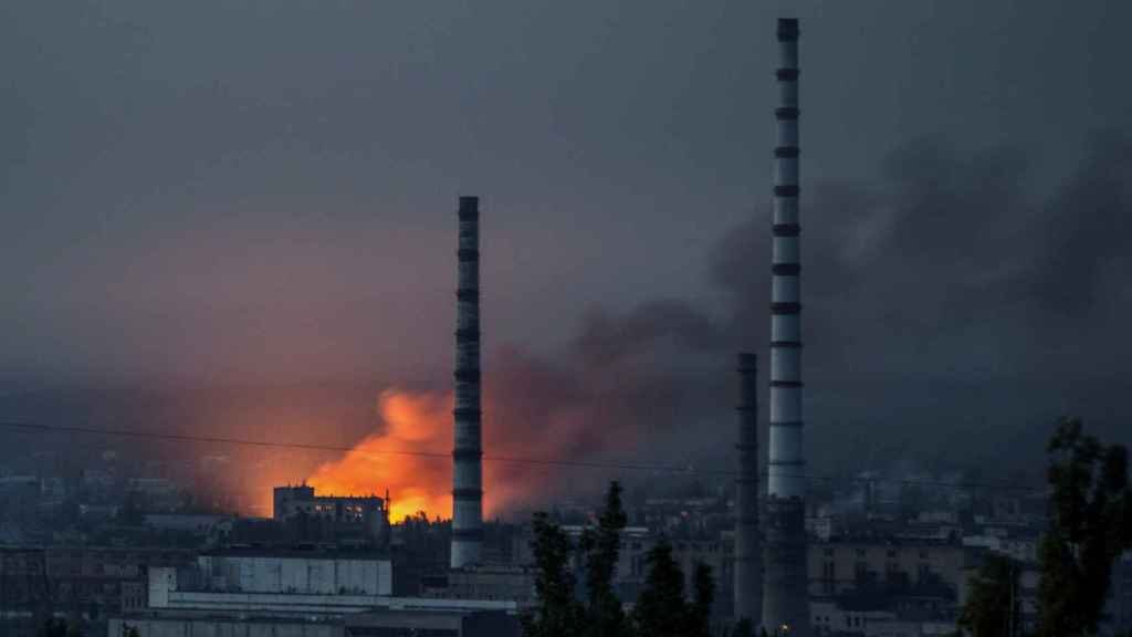 Fire and smoke rise from the Azot plant in Severodonetsk following a Russian attack on the Donetsk area