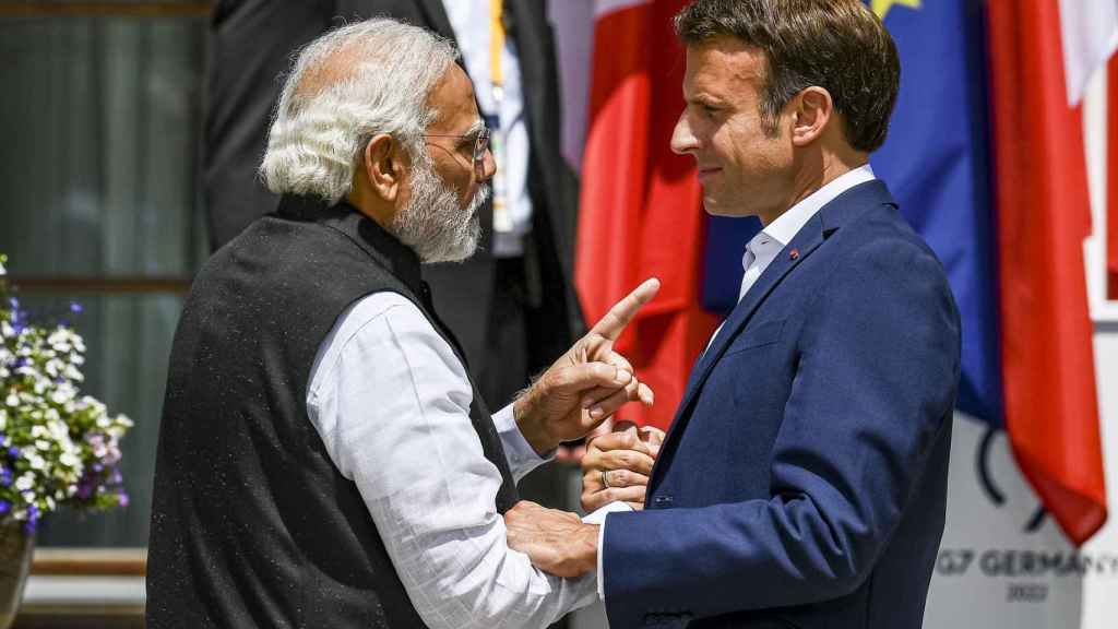 Indian Prime Minister Narendra Modi greets French President Emmanuel Macron in June this year.