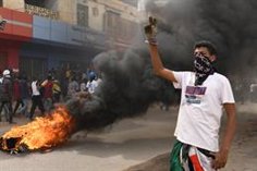 The Sudanese Police begin to disperse the massive protest in Khartoum with tear gas