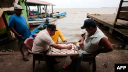 In Photos |  Nicaraguans prepare for the passage of tropical storm Bonnie