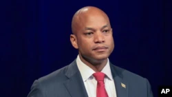 FILE - Wes Moore, best-selling author and former executive director of the Robin Hood Foundation, stands at a podium just before a debate at the Maryland Public Television studio in Owings Mills, Maryland, on June 6, 2022. .