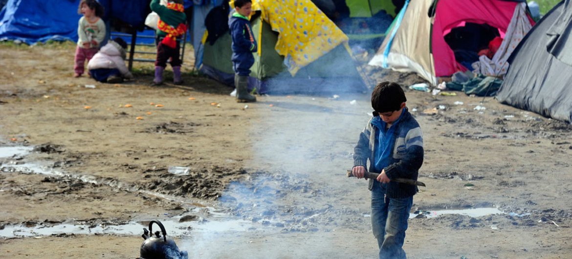 Migrant children in front of a temporary refugee camp in Idomeni (Greece).  Photo: UNICEF/Tomislav Georgiev