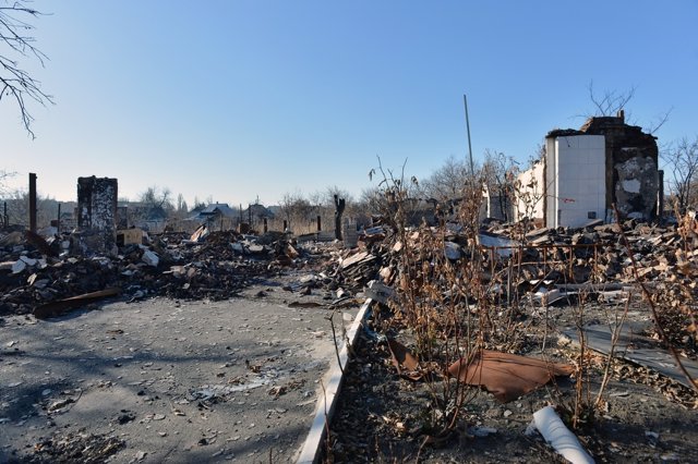 File - The rubble of a house destroyed by shelling on September 3 in Debaltsevo, in the Donetsk region.