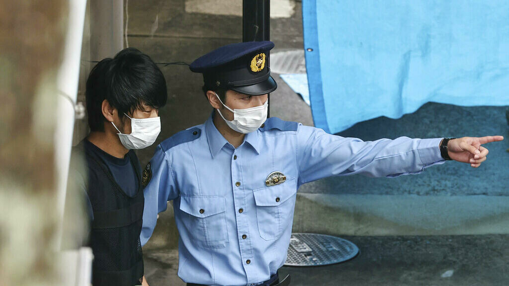 What is the 'Moon' sect and why is it linked to the murder of Shinzo Abe?