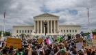 Women protest in front of the US Supreme Court