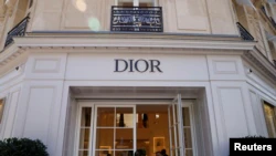 A man enters the flagship store of luxury brand Dior in Paris, France, July 13, 2022. REUTERS/Rali Benallou