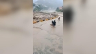 A bridge is submerged by floods in Pakistan