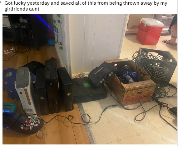 He's a hero!  Gamer saves consoles that had been thrown in the trash