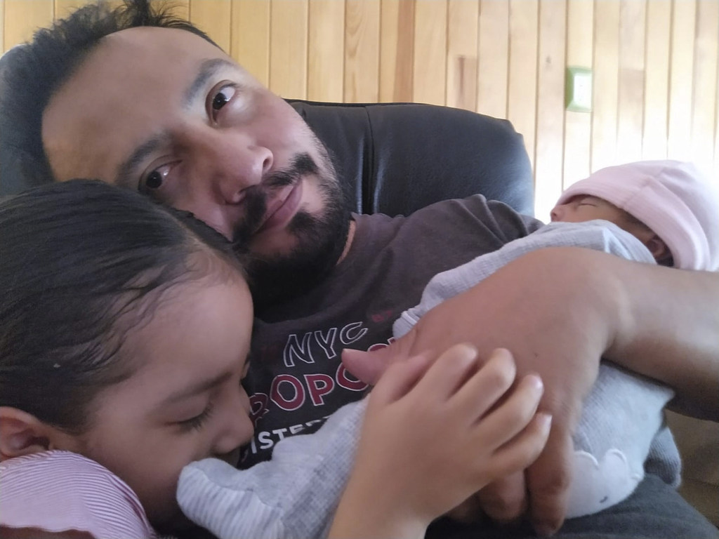 Israel Nieves poses with her daughters Paula Zoé (left) and Ximena Lucía (right) at her home in the city of Querétaro, in central Mexico. Israel works in her community to promote the Sustainable Development Goals and responsible parenthood .