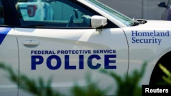 A police vehicle stands in front of the FBI Field Office in Cincinnati, Ohio, on August 11, 2022.