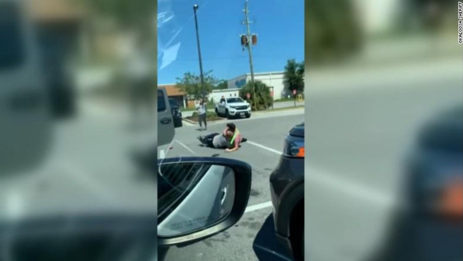 A Chick-fil-A restaurant employee struggles with a man who police say tried to steal a woman's car outside the restaurant in Fort Walton Beach, Florida.