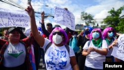 Feminists take part in a protest against El Salvador's President Nayib Bukele in San Salvador, El Salvador September 15, 2022. REUTERS/Jessica Orellana