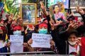 Burma court sentences Suu Kyi to another three years in prison for electoral fraud