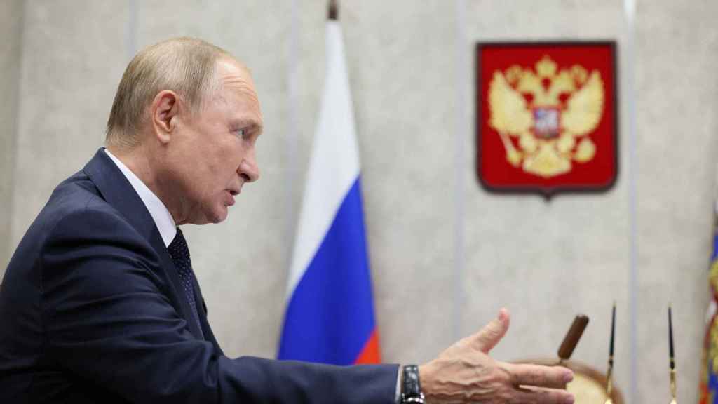 Russian President Vladimir Putin attends a meeting with Novgorod Region Governor Andrei Nikitin in the city of Veliky Novgorod, Russia, on September 21, 2022.