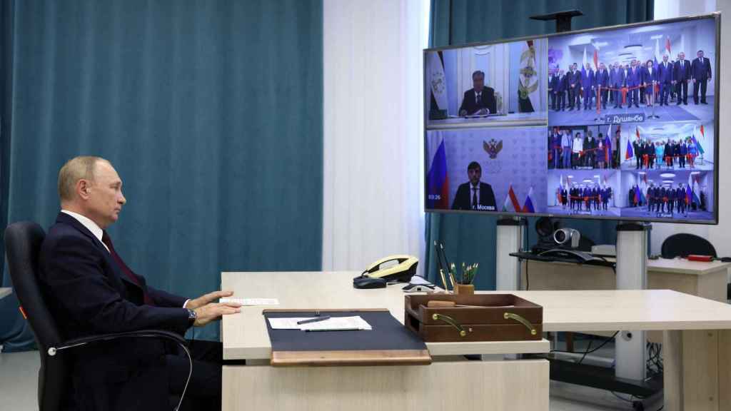 Russian President Vladimir Putin participates in a ceremony via video link.