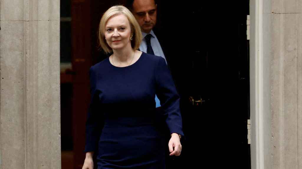 Liz Truss leaves Downing Street in a photo taken on September 23.
