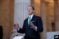 Senator Pat Toomey, R-Pennsylvania, discusses President Donald Trump's renewed North American trade agreement with Canada and Mexico during a television interview on Capitol Hill in Washington on October 2, 2018.