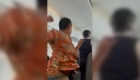 Video: a passenger hits a flight attendant in the neck