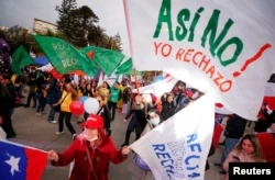 Protesters gather to show their rejection during a meeting ahead of the upcoming referendum, where Chileans will vote to approve or reject the proposed new constitution, in Viña del Mar, Chile, on August 31.  , 2022.