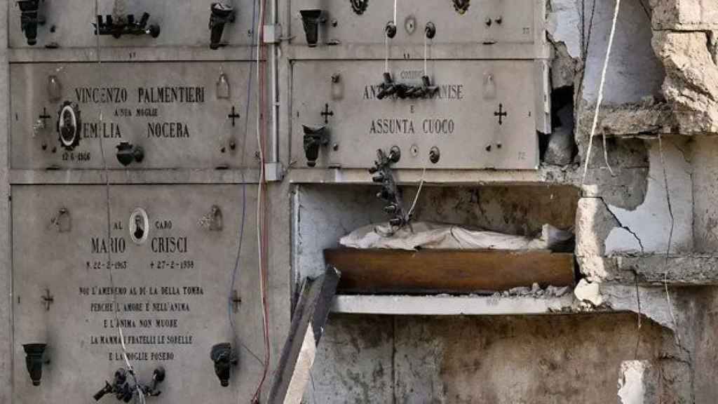 Part of the collapsed building in the Naples cemetery.