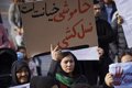 A group of Afghan women protest in Kabul for the expulsion of classmates from the university residence