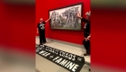 Activists stick to a Picasso painting exhibited in Australia