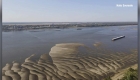 Low levels of the Mississippi River allow walking where there is usually water