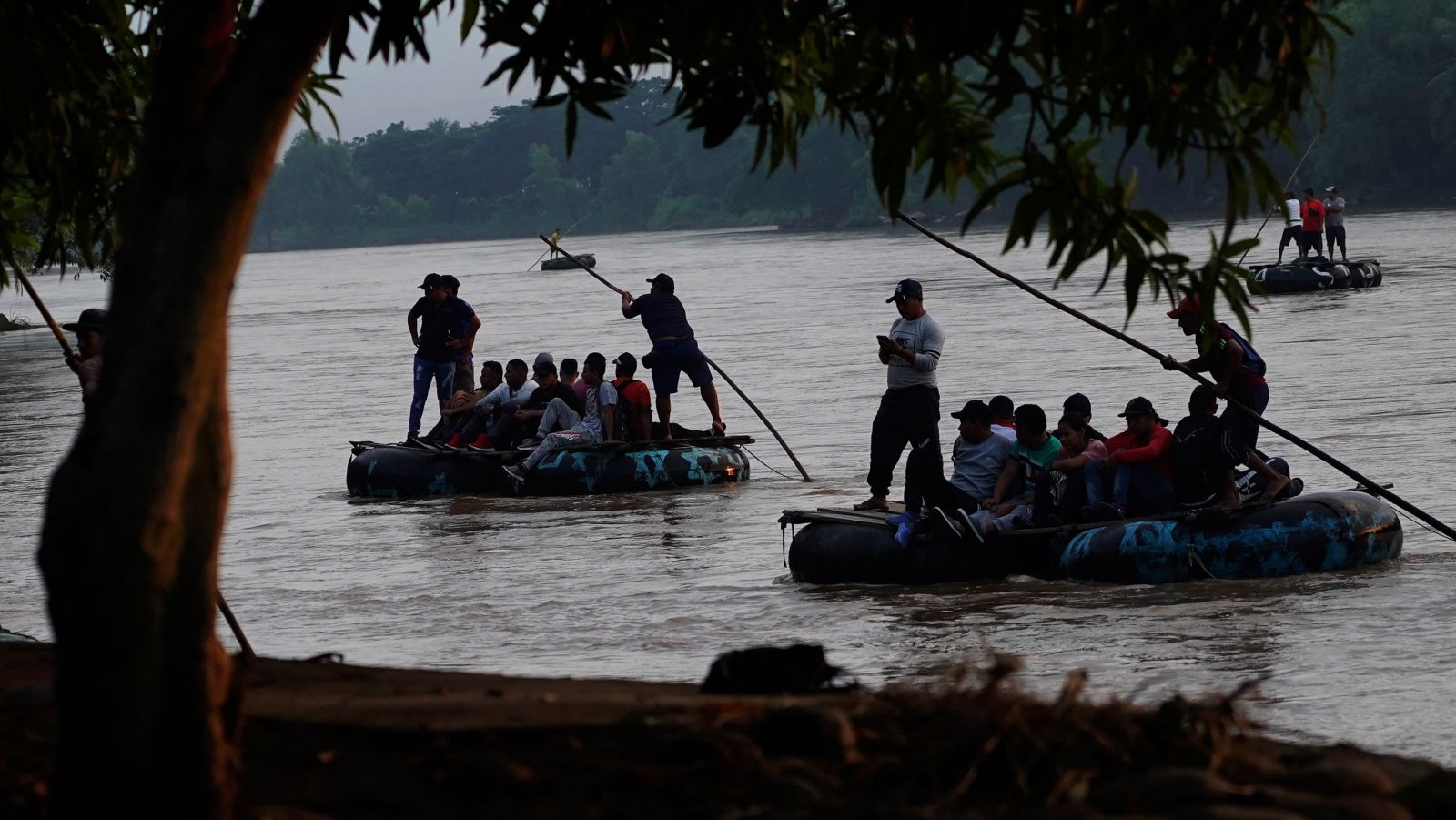 Venezuelan migrants cross the Suchiate River on the border between Guatemala and Mexico, near Ciudad Hidalgo, Mexico, on Tuesday, October 4, 2022.