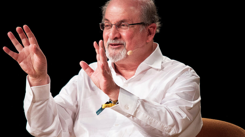 The writer Salman Rushdie loses the sight in one eye and the mobility of one hand after the attack