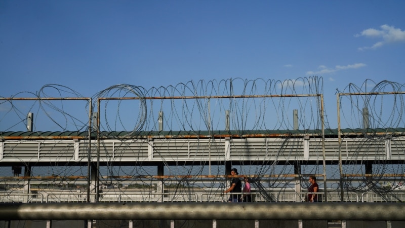 Venezuelan migrants protest at the southern US border