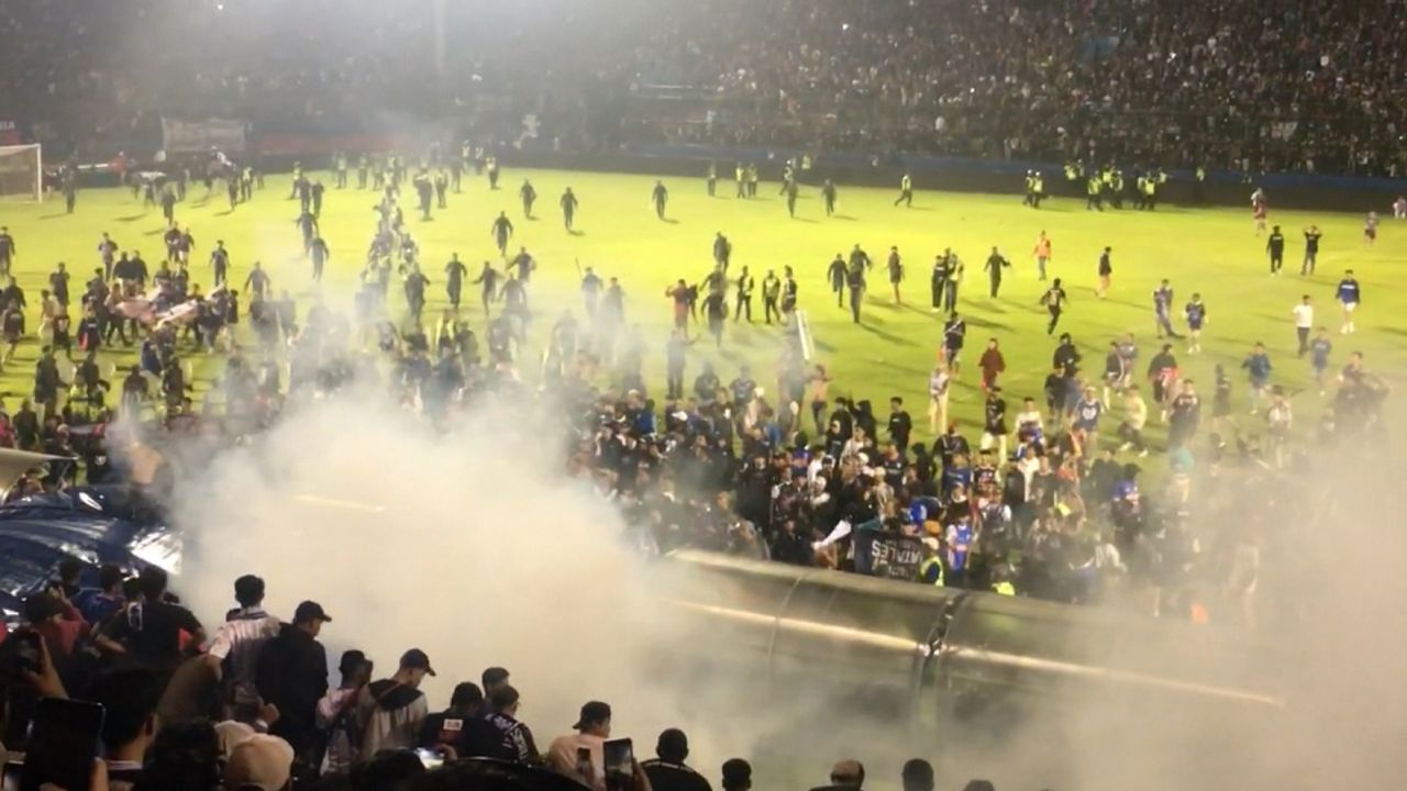 at least 127 people dead after a football game