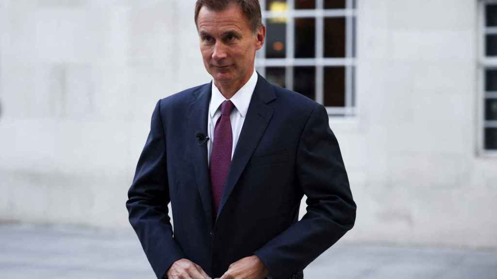 The new finance minister, Jeremy Hunt, during an interview with the BBC.