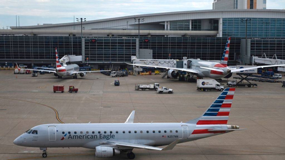 An American Airlines Embraer 175 regional flight at Dallas/Fort Worth International Airport in Dallas, Texas, on June 2, 2021. (Photo by ANDREW CABALLERO-REYNOLDS / AFP)