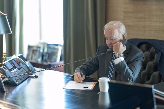 Archive - US President Joe Biden on the phone