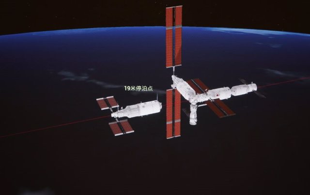 This simulated image captured at the Beijing Aerospace Control Center on November 1, 2022 shows the Mengtian laboratory module meeting and docking with the front port of the Tianhe core module.