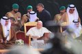 The Pope presides over a mass at the Bahrain National Stadium before thousands of people