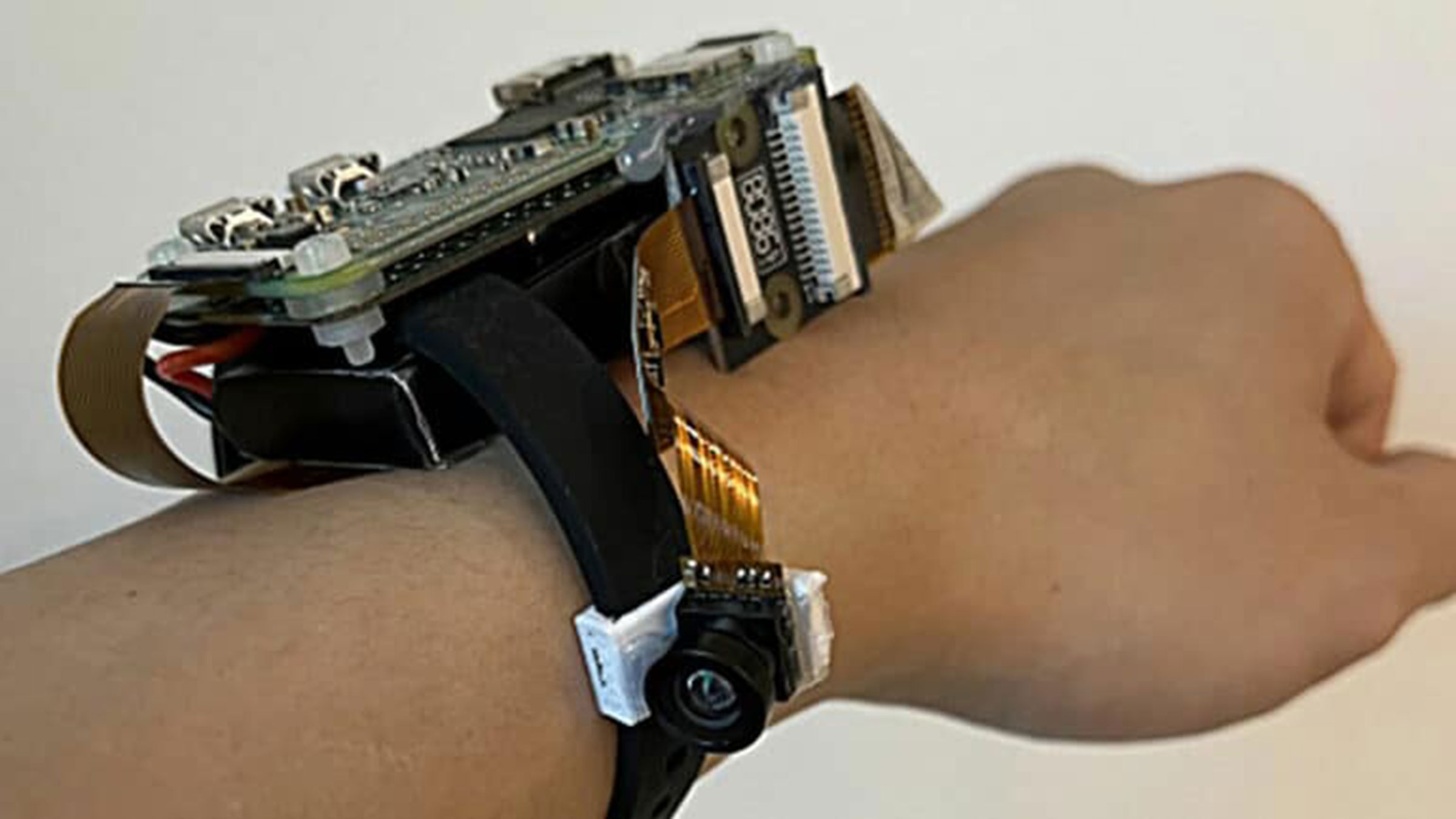 They create a bracelet capable of tracking the posture of the whole body in 3D, and using only one camera