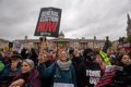 Thousands of protesters in London call for early elections