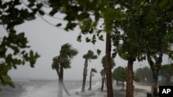 Waves crash onto the shoreline along the Jensen Beach Causeway as Hurricane Nicole approaches, on November 9, 2022, in Jensen Beach, Florida.