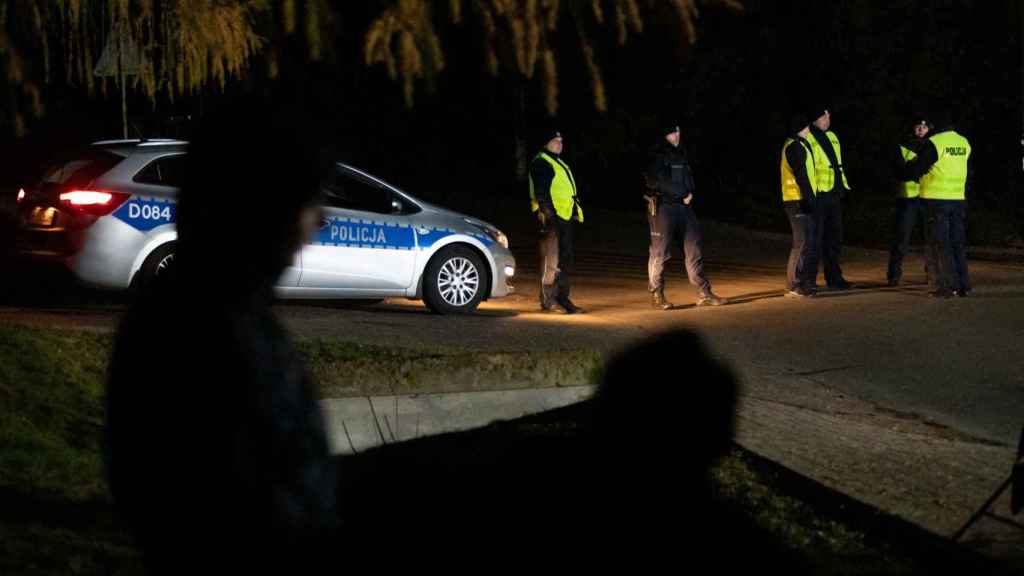 Police block a road, amid reports of two explosions, in Przewodow, Poland, on November 15, 2022.