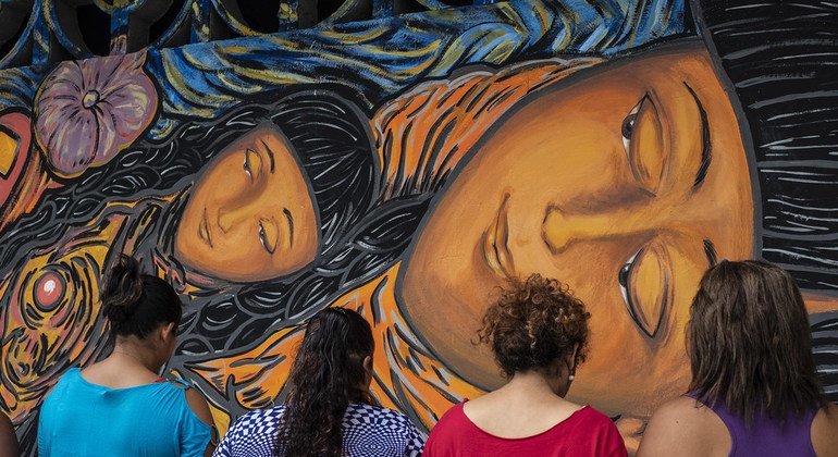 About twenty Central American women seeking asylum painted a mural against gender violence in the Mexican city of Tapachula.