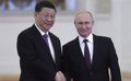 Putin says Russia-China relations are "a model of superpower cooperation"