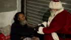 The Santa Claus that travels through the Mexican capital to help the homeless