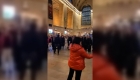 Ukrainian children sing Christmas carols at Grand Central Station