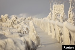 Ice formed by the waves of Lake Eire in New York on December 24, 2022.