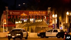 Police vehicles at the scene of the shooting in Monterey Park, California, on January 22, 2023.