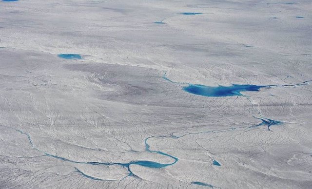 Melt ponds at the margin of the Greenland ice sheet, flight to Kangerlussuaq, late June 2012.